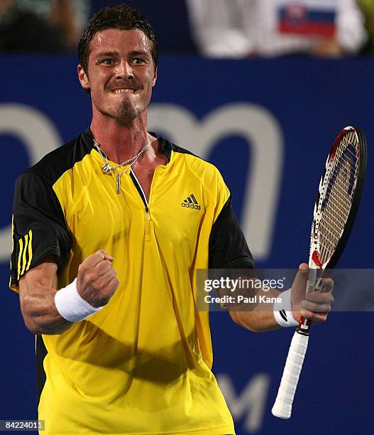Marat Safin of Russia celebrates a point against Dominik Hrbaty of the Slovak Republic during the 2009 Hopman Cup day seven men's final match between...