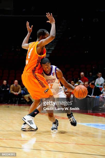 Brian Evans of the Iowa Energy goes up against Fred Gibson of the Albuquerque Thunderbirds during the D-League game on December 4, 2008 at Wells...