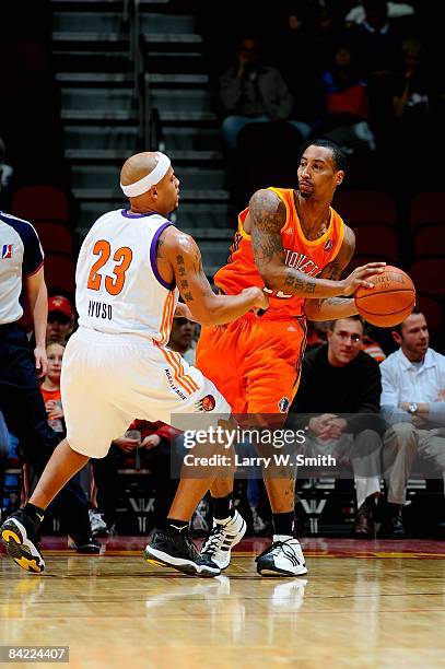 Cheyne Gadson of the Albuquerque Thunderbirds looks to pass over Larry Ayuso of the Iowa Energy during the D-League game on December 4, 2008 at Wells...