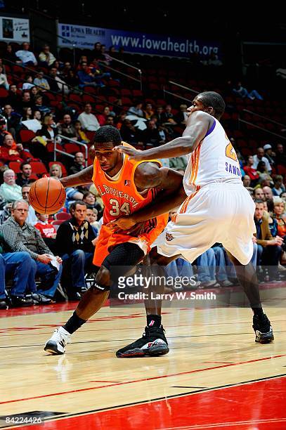 David Noel of the Albuquerque Thunderbirds drives to the basket past Patrick Sanders of the Iowa Energy during the D-League game on December 4, 2008...