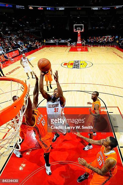 Cartier Martin of the Iowa Energy shoots over David Monds of the Albuquerque Thunderbirds during the D-League game on December 4, 2008 at Wells Fargo...
