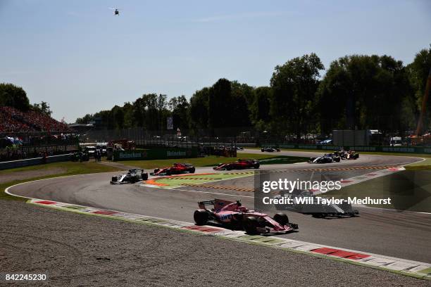 Esteban Ocon of France driving the Sahara Force India F1 Team VJM10 and Lance Stroll of Canada driving the Williams Martini Racing Williams FW40...