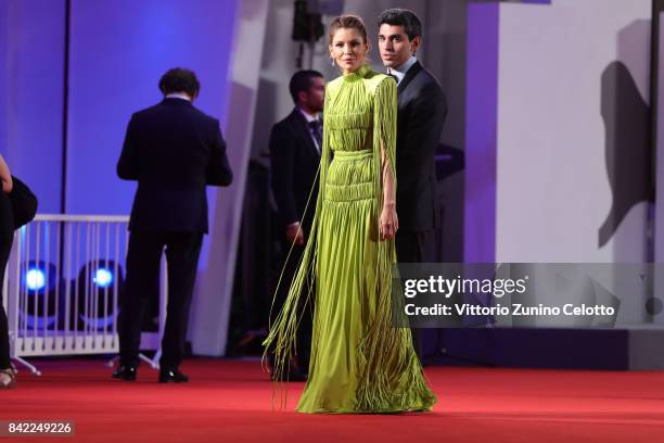 Lola Karimova-Tillyaeva and and Timur Tillyaev walk the red carpet ahead of the 'The Leisure Seeker ' screening during the 74th Venice Film Festival...