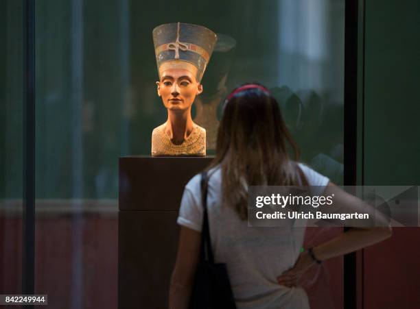 The New Museum on the Berlin Museum Island. The photo shows tourists at the world famous, approx 3000 years old bust, of the pharao godess Nefertiti.