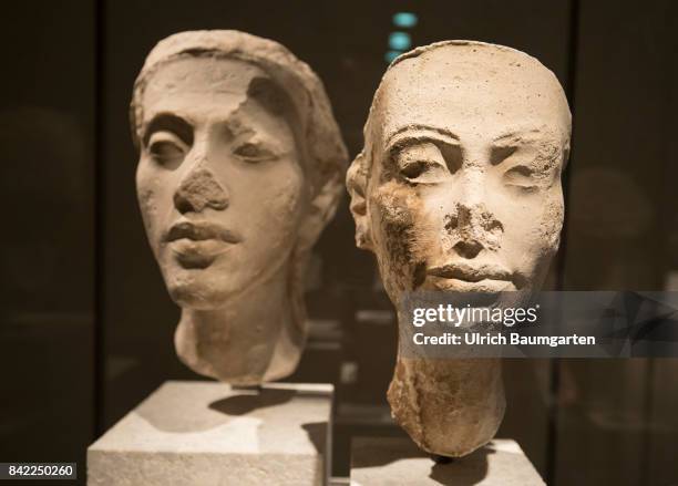 The New Museum on the Museum Island in Berlin. The photo shows the potrait heads of the royal couple Nefertiti and Akhenaten .