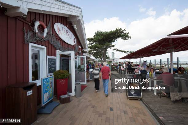 Summer holidays and beach holidays in Scharbeutz at the Baltic Sea - beach promenade, restaurant.