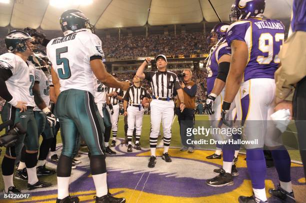 Referee Tony Corrente flips the coin before the game between the Philadelphia Eagles and the Minnesota Vikings on January 4, 2009 at the Hubert H....