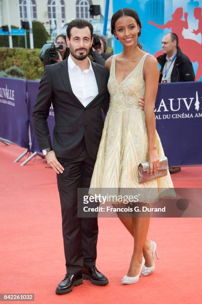 Miss France 2014 and Miss Universe 2015 3rd Runner-up, Flora Coquerel and her companion Ugo Ciulla arrive at the "Kidnap" premiere during the 43rd...