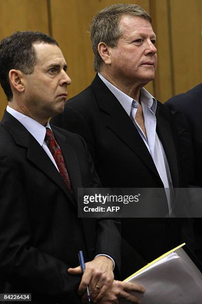 Actor Ryan O'Neal stands by his attorney Mark Werksman inside of the courthouse in Malibu, California, January 9, 2009. O'Neal and his son Redmond...