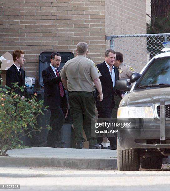 Actor Ryan O'Neal , his son Redmond O'Neal and attorney Mark Werksman leave the courthouse in Malibu, California, January 9, 2009. O'Neal and his son...