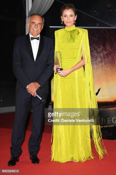 Lola Karimova-Tillyaeva is awarded by Alberto Barbera at the Kineo Diamanti Awards during the 74th Venice Film Festival at Excelsior Hotel on...