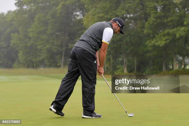 Sergio Garcia of Spain putts with an iron on the 15th green during round three of the Dell Technologies Championship at TPC Boston on September 3,...