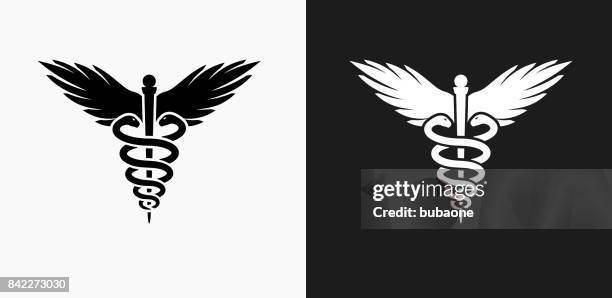 caduceus icon on black and white vector backgrounds - medical symbol stock illustrations