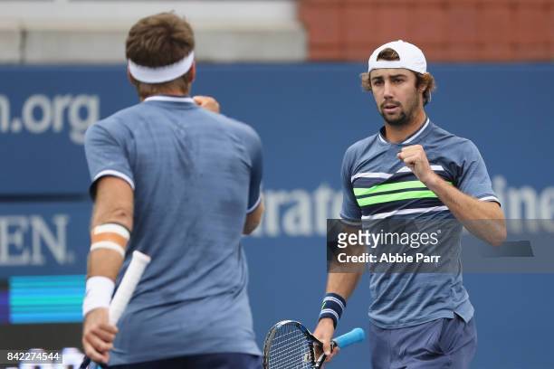 Jordan Thompson of Australia and Robert Lindstedt of Sweden in action during their men's doubles second round against John Millman of Australia and...
