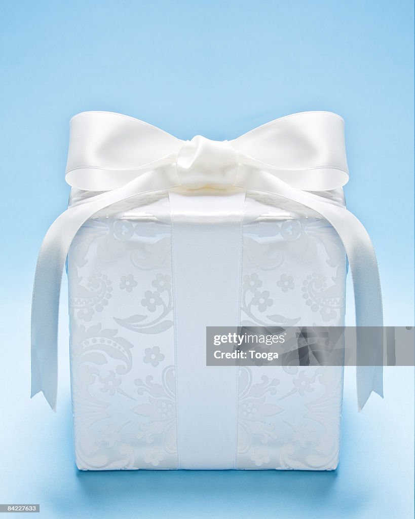 White present on blue background