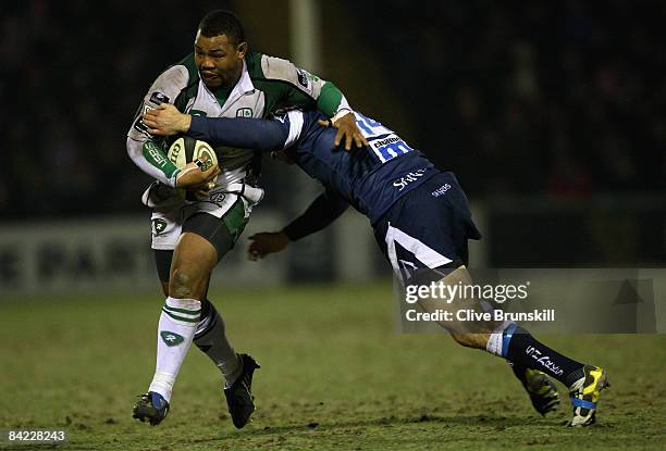 Steffon Armitage of London Irish is tackled by Chris Bell during the Guinness Premiership match between Sale Sharks and London Irish at Edgeley Park...