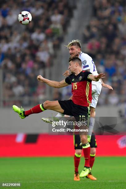 Tasos Donis forward of Greece jumps higher Thomas Meunier defender of Belgium during the World Cup Qualifier Group H match between Greece and Belgium...