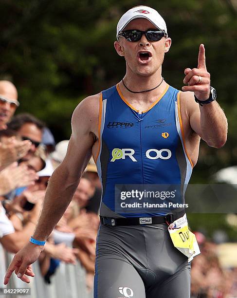 Duncan Milne of Taupo celebrates winning the men's division of the Port Of Tauranga Half Ironman at Mount Maunganui on January 10, 2009 in Tauranga,...