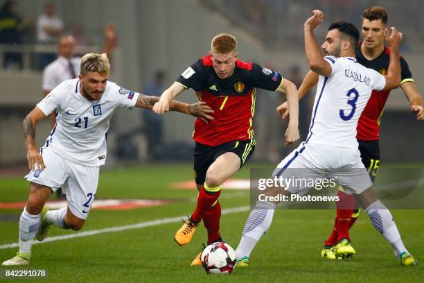 Kostas Stafylidis midfielder of Greece and Kevin De Bruyne forward of Belgium and Giorgios Tzavellas defender of Greece during the World Cup...