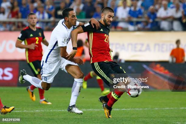 Yannick Carrasco forward of Belgium and Zeca midfielder of Greece during the World Cup Qualifier Group H match between Greece and Belgium at the...