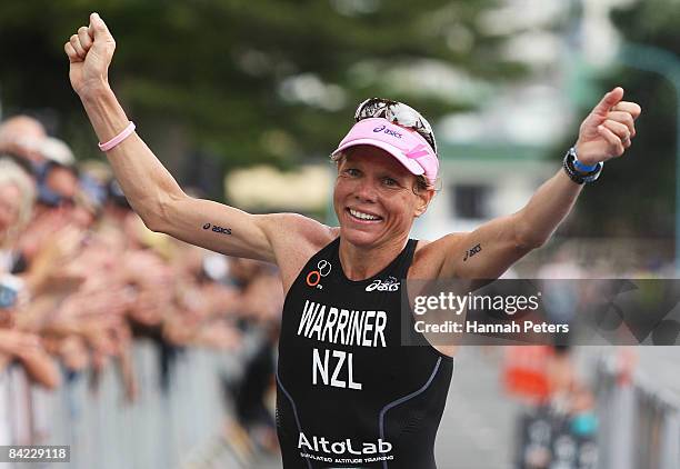 Samantha Warriner of Whangarei celebrates winning the women's division of the Port Of Tauranga Half Ironman at Mount Maunganui on January 10, 2009 in...