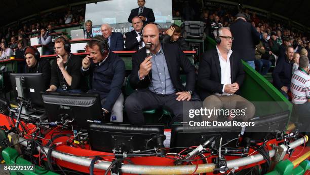 Lawrence Dallaglio, the BT Sport rugby pundit with Austin Healey and Nick Mullins during the Aviva Premiership match between Leicester Tigers and...