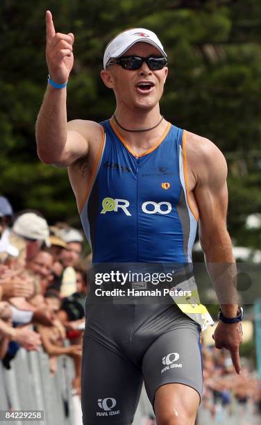 Duncan Milne of Taupo celebrates winning the men's division of the Port Of Tauranga Half Ironman at Mount Maunganui on January 10, 2009 in Tauranga,...