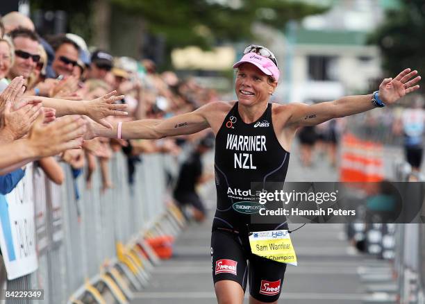 Samantha Warriner of Whangarei celebrates winning the women's division of the Port Of Tauranga Half Ironman at Mount Maunganui on January 10, 2009 in...