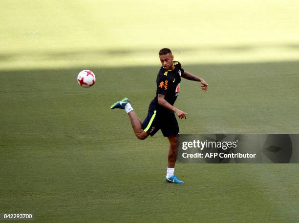 Brazil's striker Neymar takes part in a training session in Arena Amazonia, Manaus, Brazil, on September 3, 2017 ahead of their upcoming 2018 FIFA...