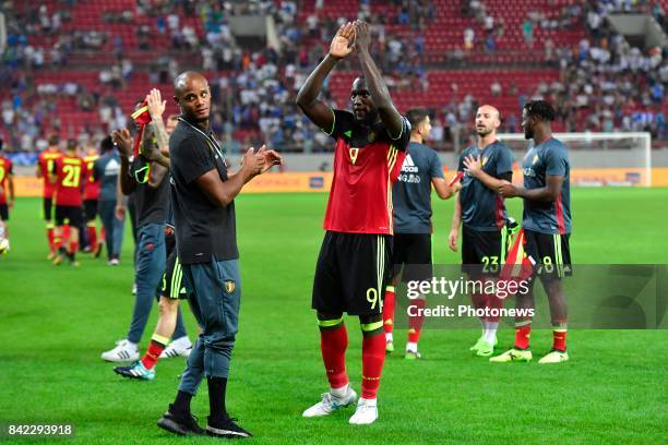 Vincent Kompany defender of Belgium and Romelu Lukaku forward of Belgium celebrating the victory towards their supporters after the World Cup...