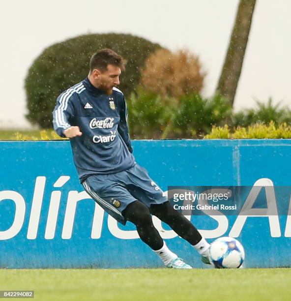 Lionel Messi of Argentina kicks the ball during a training session at 'Julio Humberto Grondona' training camp on September 03, 2017 in Ezeiza,...