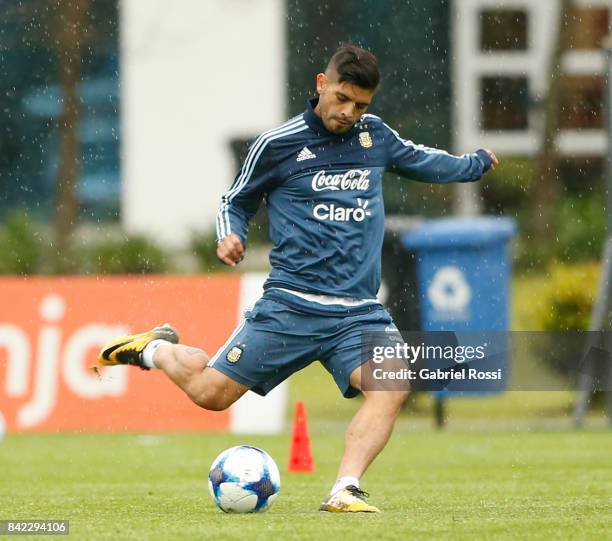 Ever Banega of Argentina kicks the ball during a training session at 'Julio Humberto Grondona' training camp on September 03, 2017 in Ezeiza,...