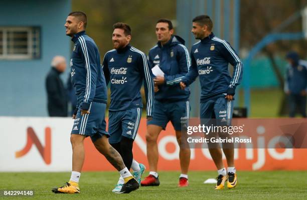 Mauro Icardi, Lionel Messi, Lautaro Acosta and Ever Banega of Argentina warm up during a training session at 'Julio Humberto Grondona' training camp...