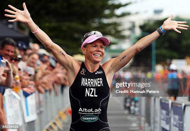 Samantha Warriner of Whangarei celebrates winning the women's division of the Port Of Tauranga Half Ironman at Mount Maunganui on January 10, 2009 in...