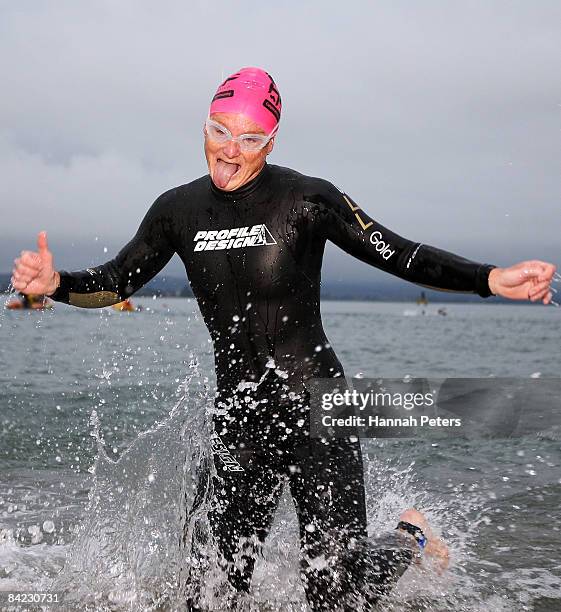 Joanna Lawn of Auckland finishes the swim leg during the women's division of the Port Of Tauranga Half Ironman at Mount Maunganui on January 10, 2009...