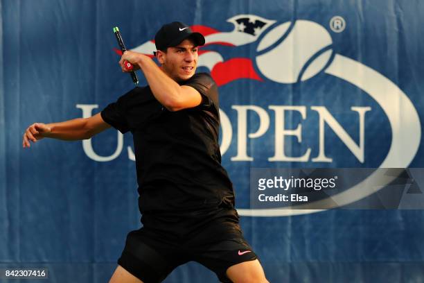 Yshai Oliel of Israel in action against Ryan Goetz of the United States during their boy's singles first round match on Day Seven of the 2017 US Open...