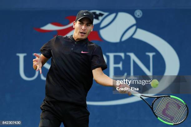 Yshai Oliel of Israel in action against Ryan Goetz of the United States during their boy's singles first round match on Day Seven of the 2017 US Open...