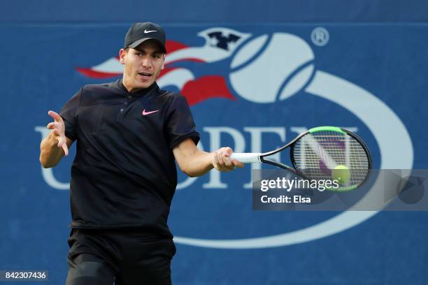 Yshai Oliel of Israel in action against Ryan Goetz of the United States during their boy's singles first round match on Day Seven of the 2017 US Open...