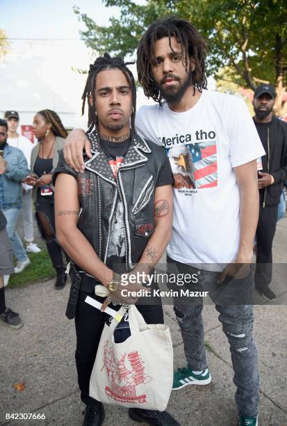 Rappers Vic Mensa and J. Cole pose backstage during the 2017 Budweiser Made in America festival - Day 2 at Benjamin Franklin Parkway on September 3,...