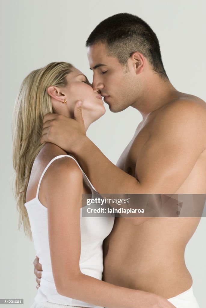 Hispanic couple kissing