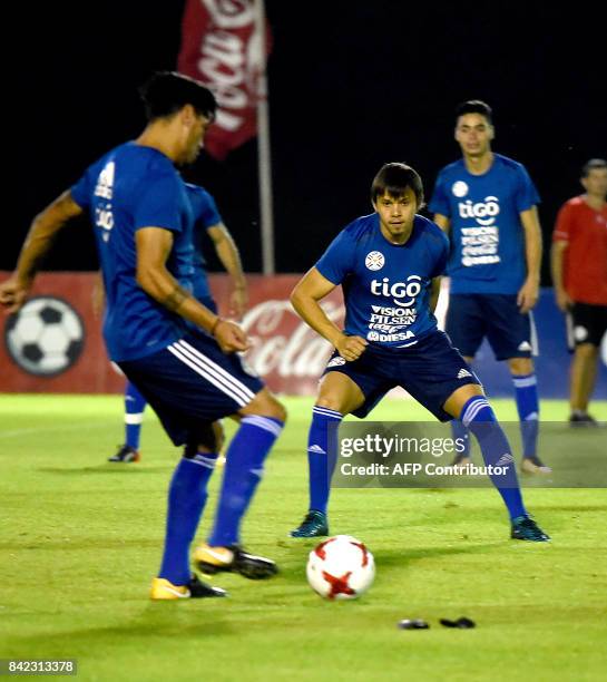 Paraguayan national football team player Oscar Romero takes part in a training session at the Complejo Albiroga training centre in Ypane, near...