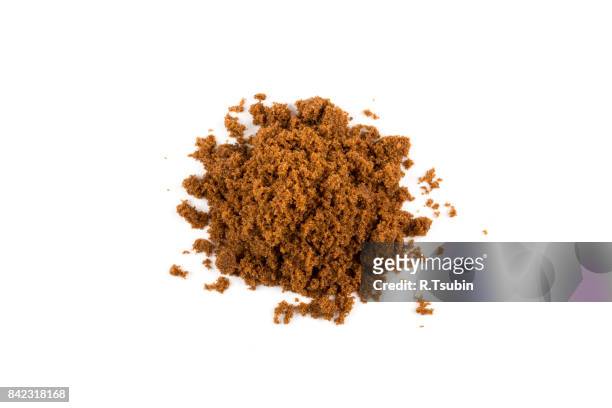 brown sugar on white - molasses foto e immagini stock
