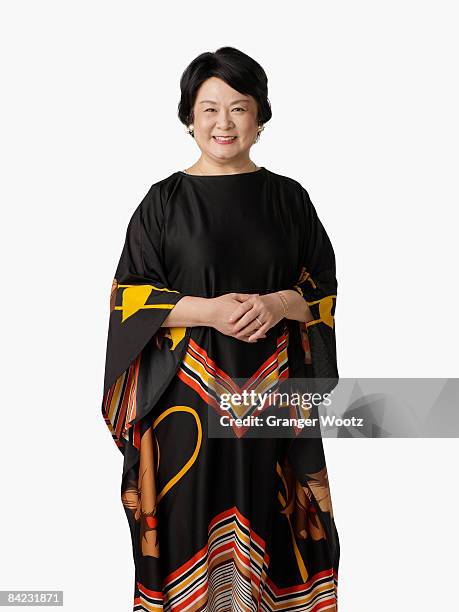 confident asian woman smiling - kaftan stock pictures, royalty-free photos & images
