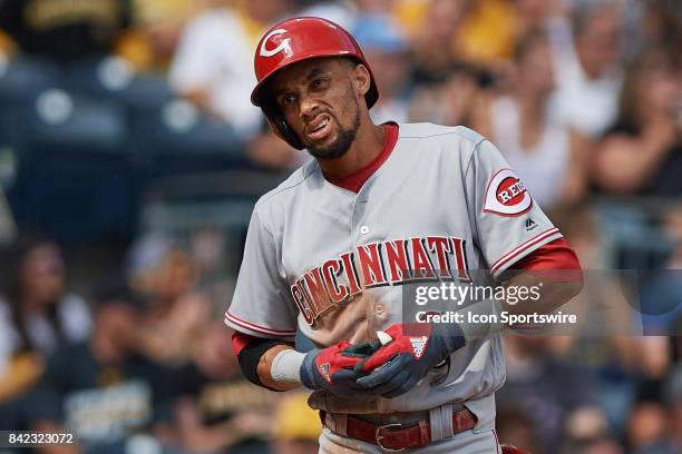 Cincinnati Reds center fielder Billy Hamilton reacts to his pop fly during a MLB game between the Pittsburgh Pirates and the Cincinnati Reds on...