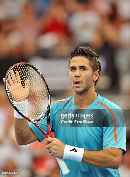Fernando Verdasco of Spain waves tot he crowd after beating Paul-Henri Mathieu of France in their semifinal match on day seven of the Brisbane...