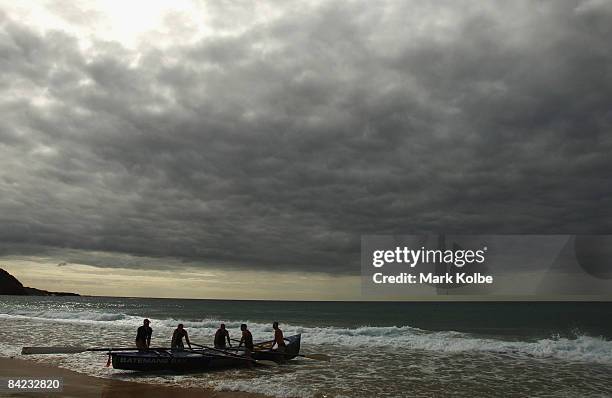 The crew from Batemans Bay prepare themselves to race during round three of the South Coast Surf Boat Series at Port Kembla Beach of January 10, 2009...