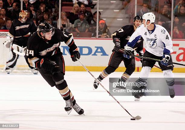 Bobby Ryan of the Anaheim Ducks handles the puck against the Tampa Bay Lighting the during game on January 9, 2009 at Honda Center in Anaheim,...