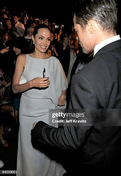 Actors Angelina Jolie and Brad Pitt arrive on the red carpet at VH1's 14th Annual Critics' Choice Awards held at the Santa Monica Civic Auditorium on...