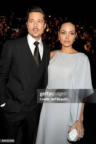 Actors Brad Pitt and Angelina Jolie arrive on the red carpet at VH1's 14th Annual Critics' Choice Awards held at the Santa Monica Civic Auditorium on...