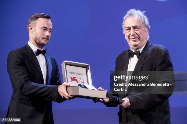 Stephen Frears receives The Jaeger-LeCoultre Glory To The Filmmaker Award and Reverso engraved watched from Chief Marketing Officer of...